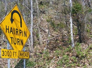 sign_road_hairpin_600x300-min